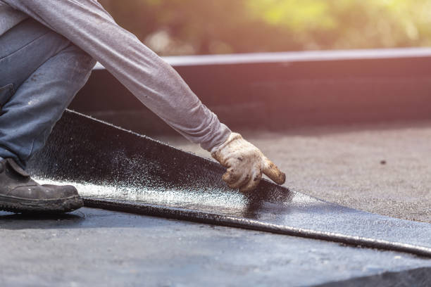 Professional Waterproofing technician working in Madison, MN